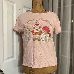 Pink strawberry shortcake graphic tee